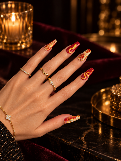 Crimson Serpent red and gold coffin press-on nails with sculpted serpent details and jewel accents