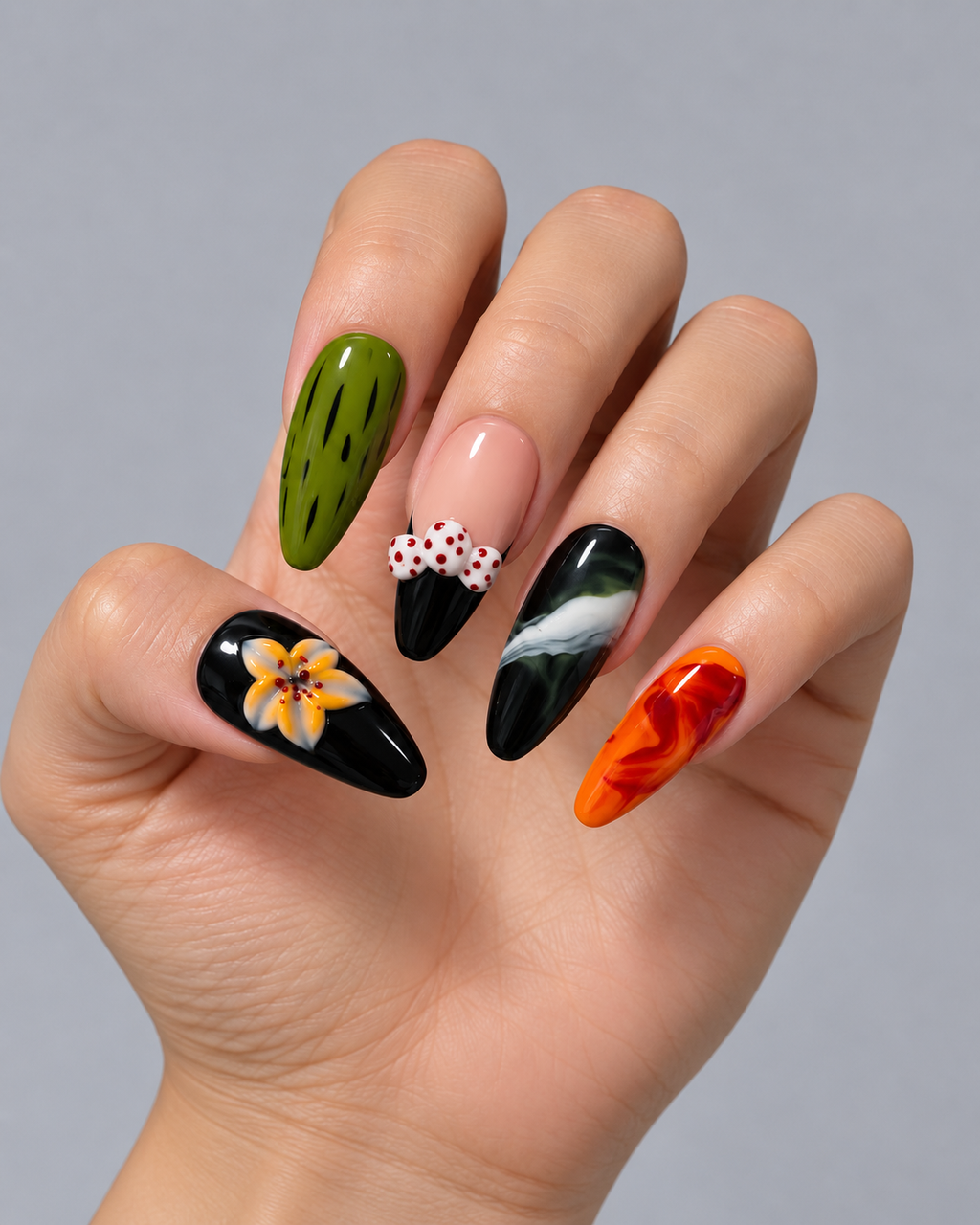 Close-up of multicolour press-on nails with sculpted flowers, translucent accents and abstract 3D detailing