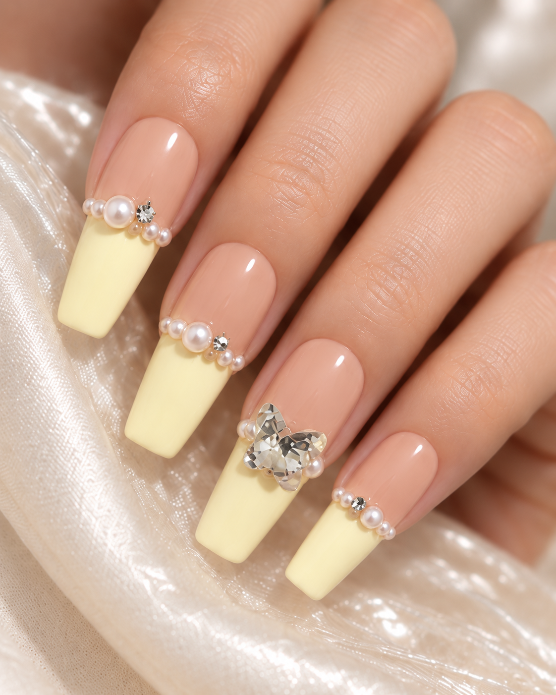 Pearl French cream-glow long coffin press-on nails with a soft French manicure and pearl detailing