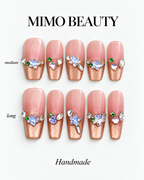 Champagne Bloom coffin press-on nails shown in medium and long lengths