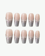 Handmade nude and smoky grey long coffin press-on nails with shimmer and floral detailing