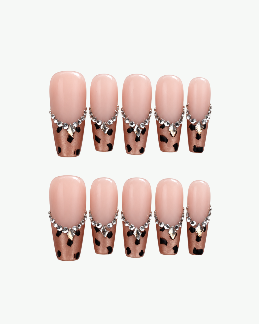 Handmade nude pink leopard press-on nails with crystal edging in long coffin and oval shapes