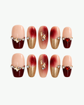 Handmade burgundy nude and gold medium coffin press-on nails with red heart gem pearls crystals and metallic charms
