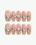 Handmade nude pink and champagne gold coffin press-on nails with floral and crystal details