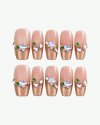 Handmade nude pink and champagne gold coffin press-on nails with floral and crystal details