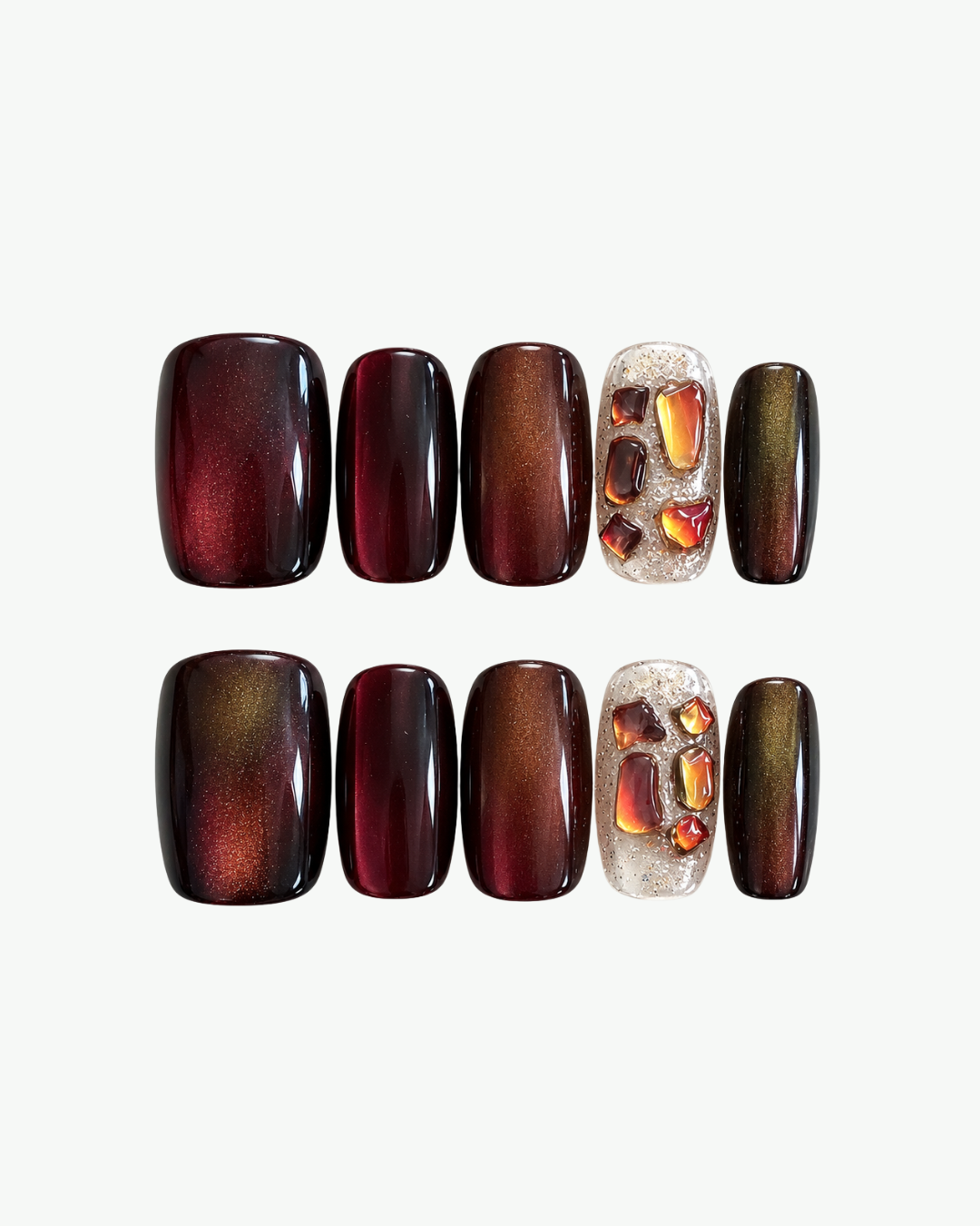 Handmade burgundy brown short squoval press-on nails with cat-eye shimmer and crystal accent