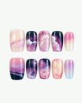 Handmade violet pink navy and white squoval press-on nails with abstract ink wash and marbled design
