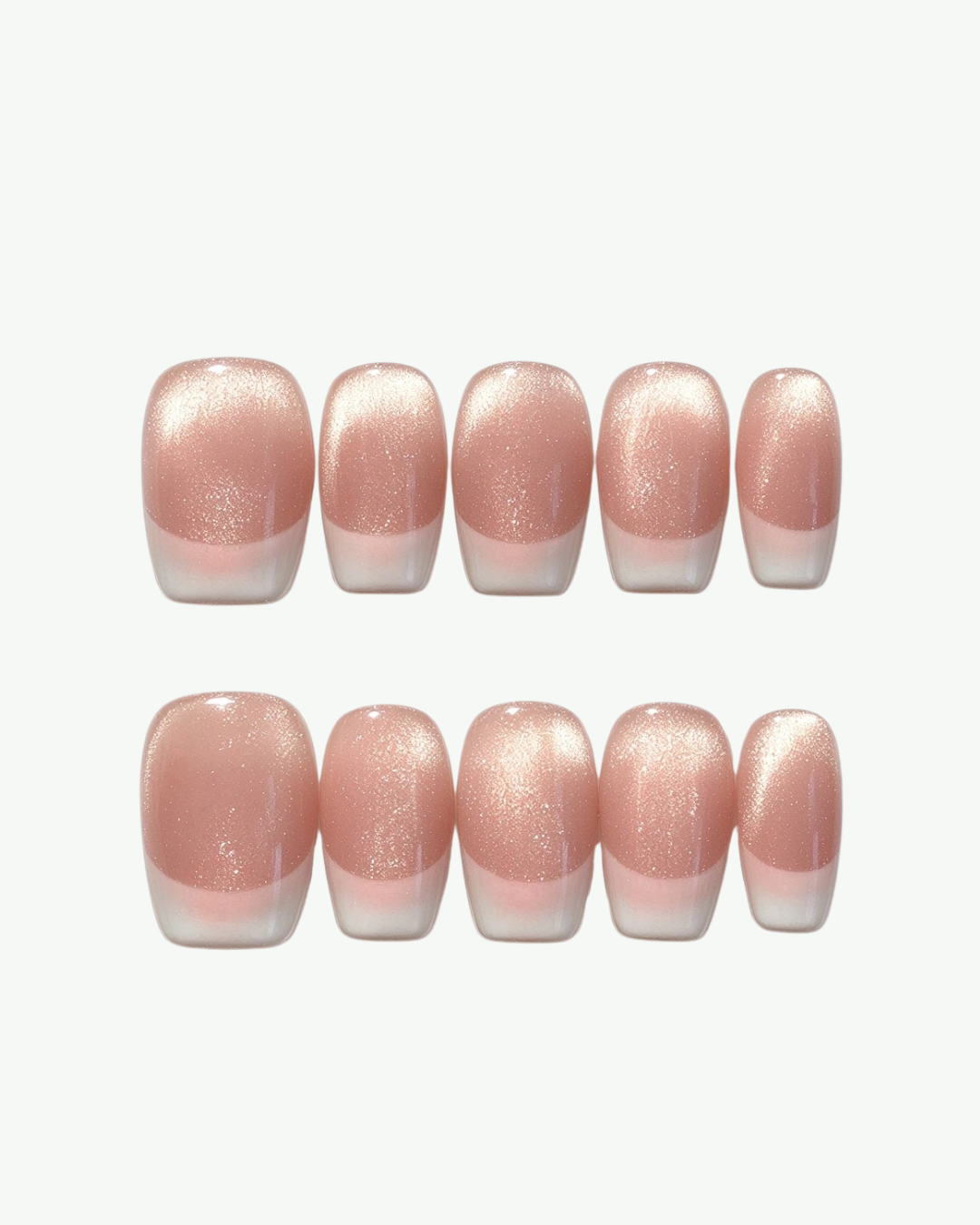 Handmade soft pink and white short squoval French press-on nails with a classic glossy finish