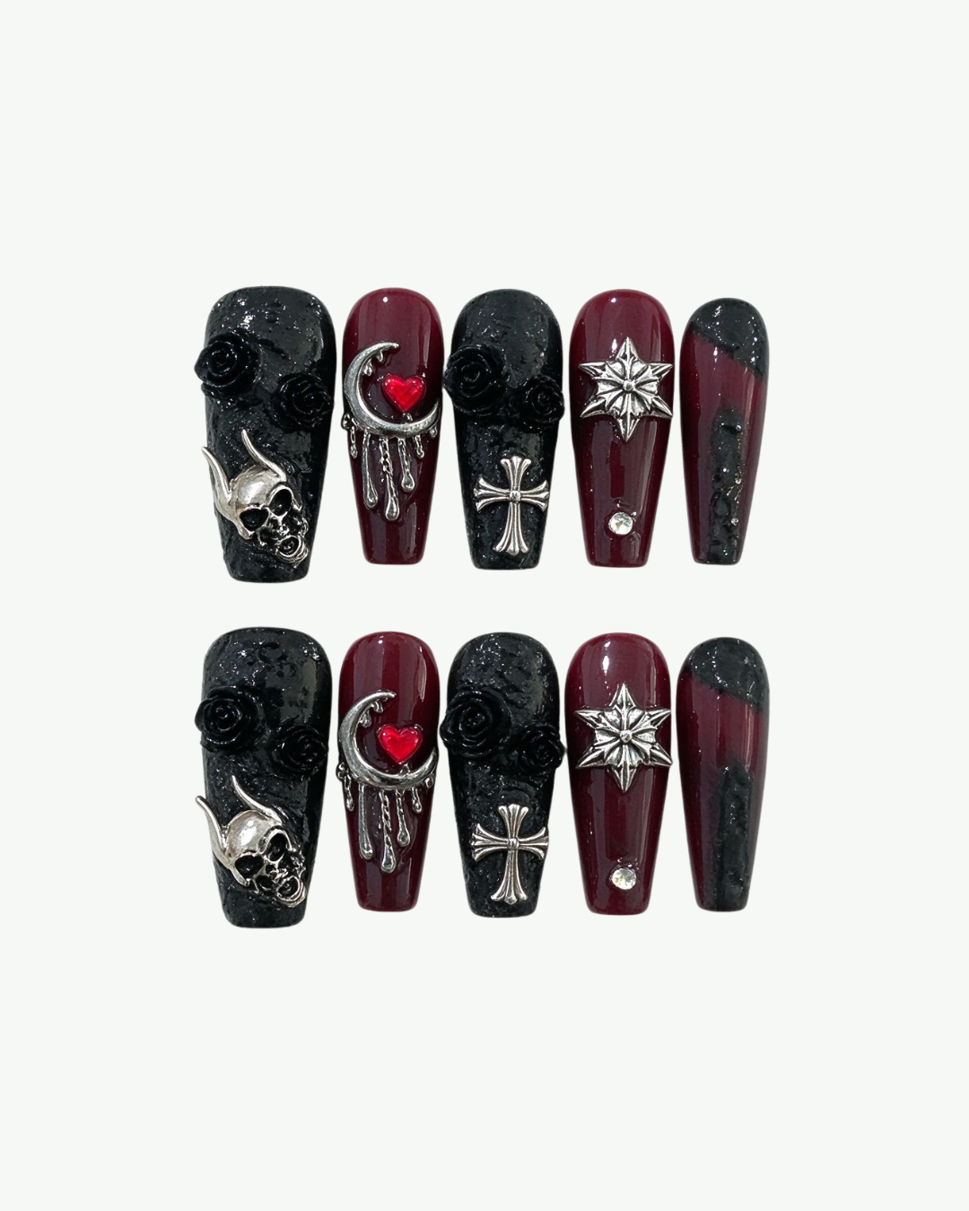 Handmade burgundy and black gothic press-on nails with 3D charms and crystal details for Halloween styling