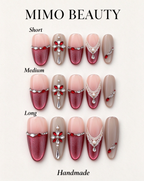 Handmade nude and red oval press-on nails with crystal and lace-inspired details shown in short, medium and long lengths